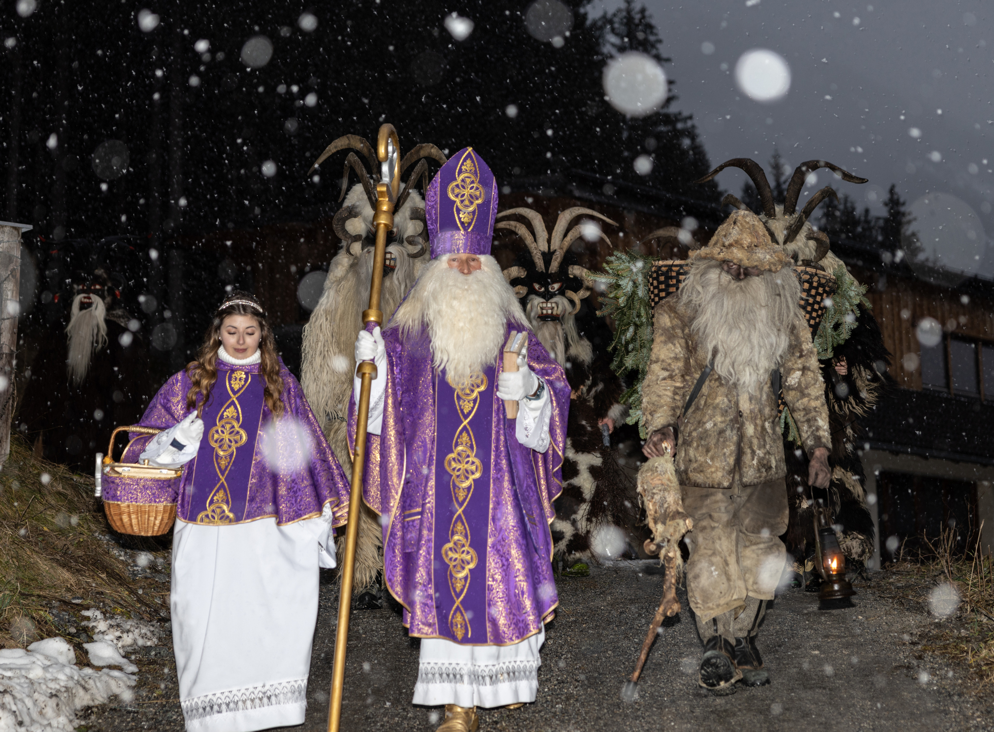The procession of St. Nicholas and the Krampus in early December on a snowy night, Austria, Gastein. High quality photo